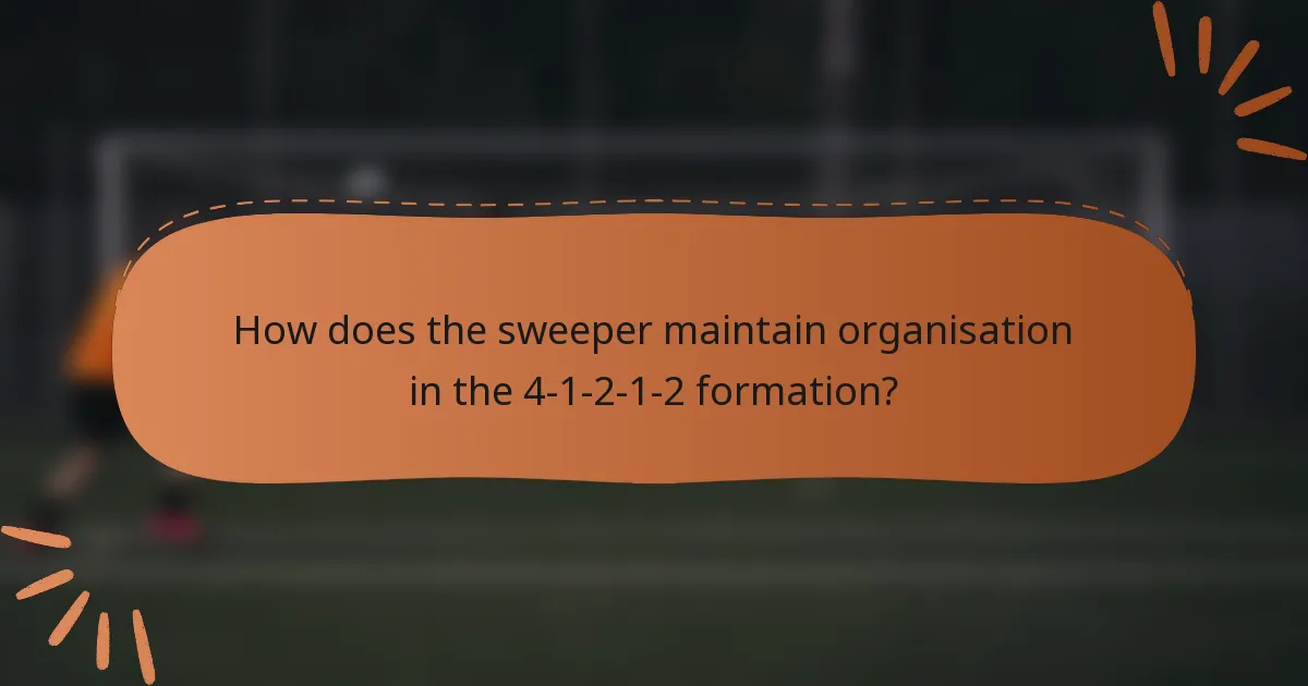 How does the sweeper maintain organisation in the 4-1-2-1-2 formation?